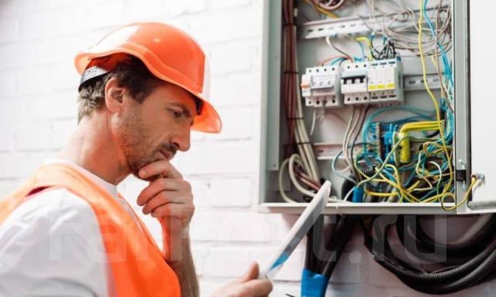 Electrician repairing electrical board the dar electric
