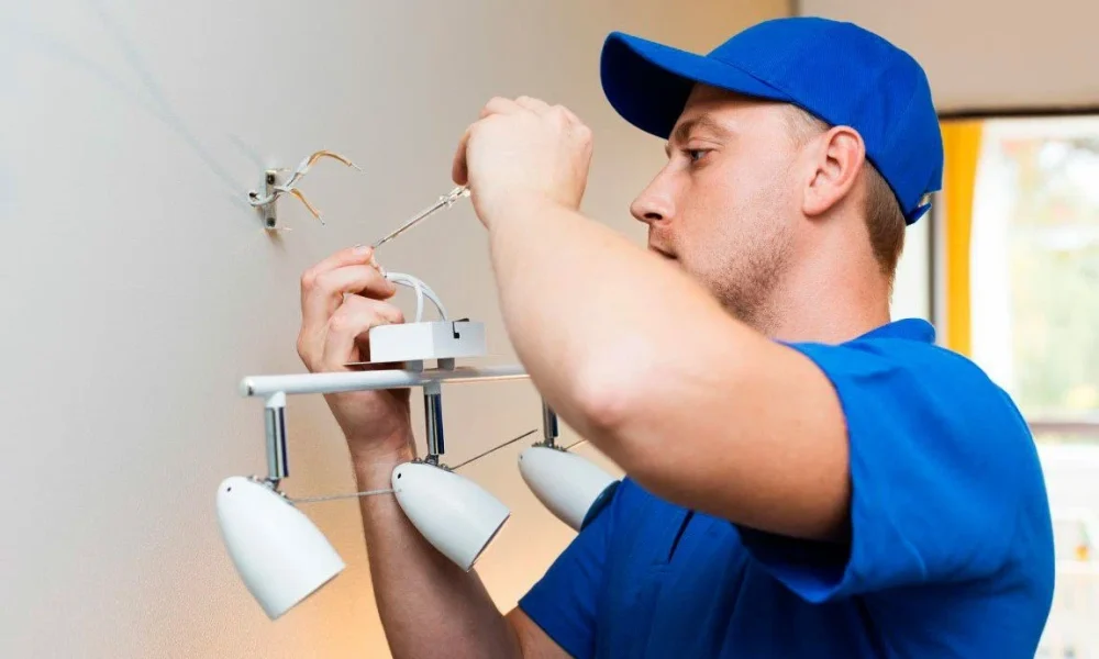 Electrician working project light in new jersey