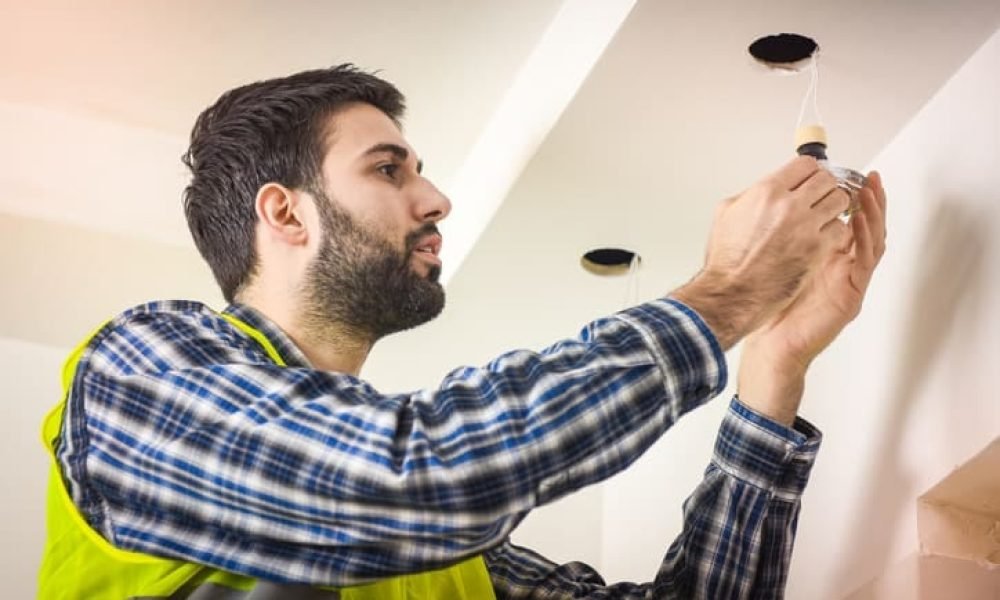 Electrician repairing electrical board in new jersey